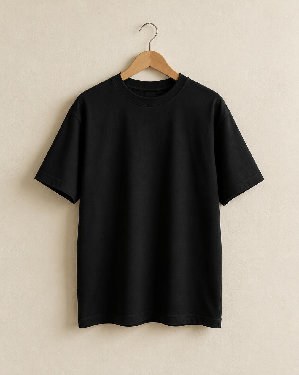WOKE. Heavyweight Tee — Black concept, front view